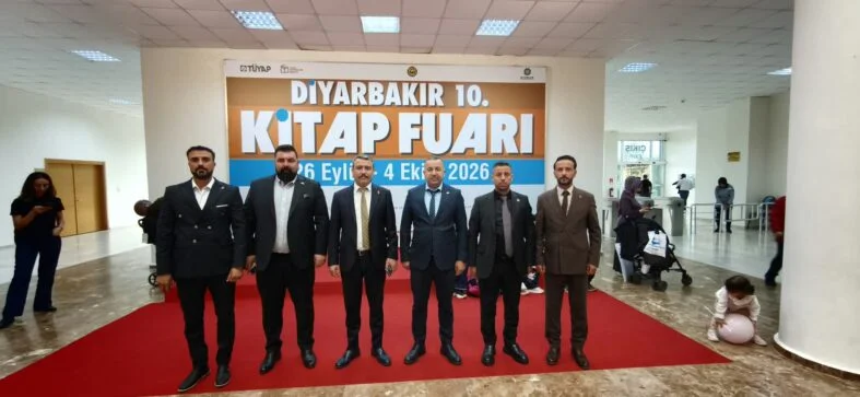 MHP’li Özcoşkun, 10’uncu Kitap Fuarını Ziyaret Etti